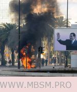 tunis_brule_sous_regard_ben_ali.jpg (35 KB)